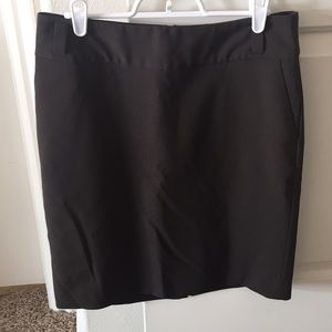 Wool knee length Skirt. has little tear on back